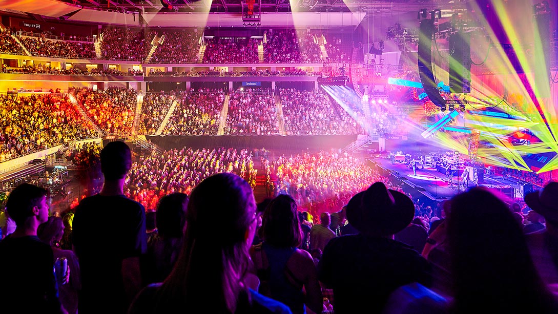 A crowd of people in a stadium.