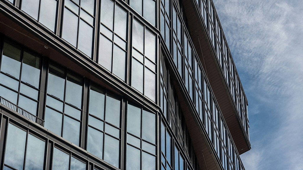 Detail shot of exterior glass facade of 111 Harbor Way