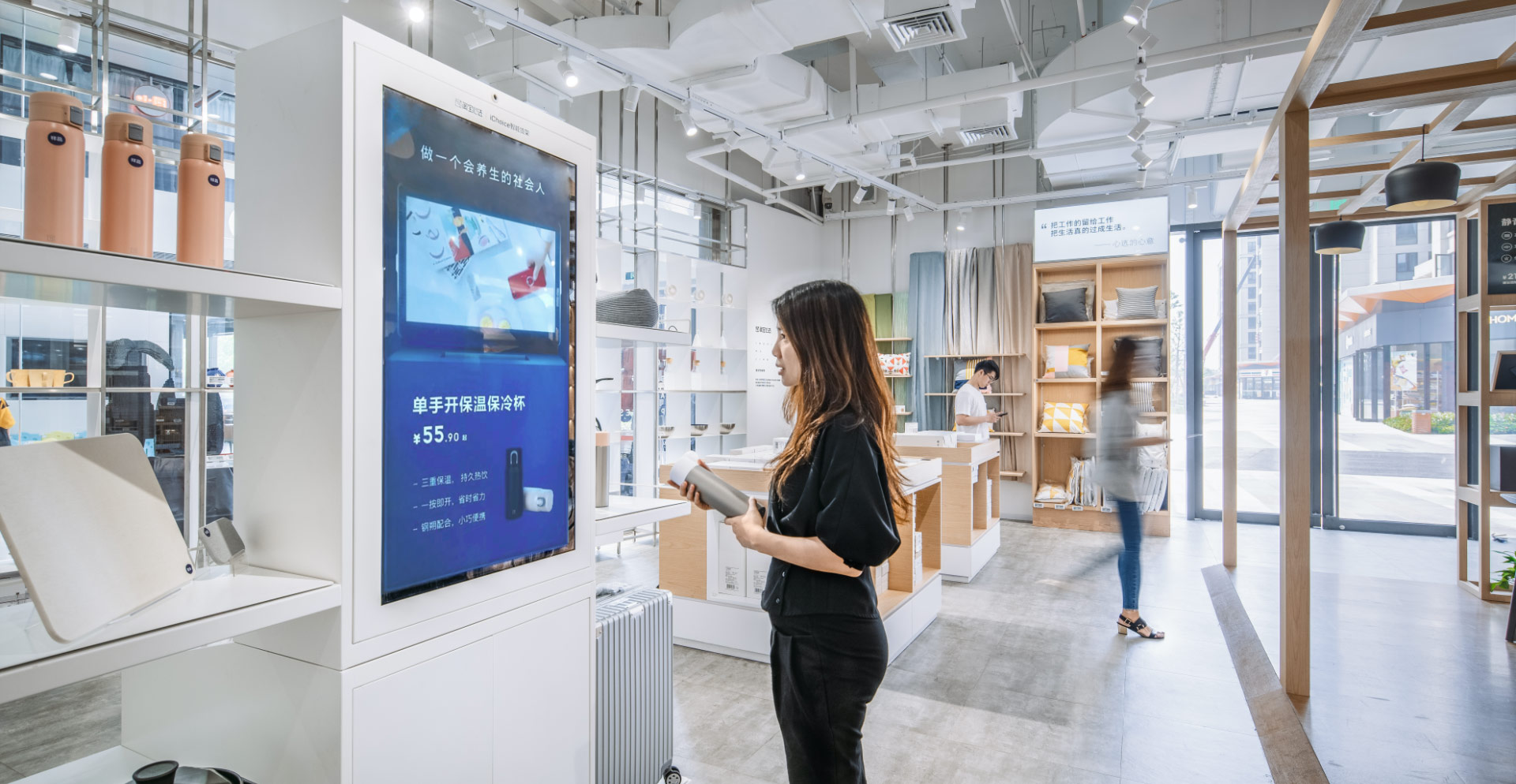 A person looking at a tablet.