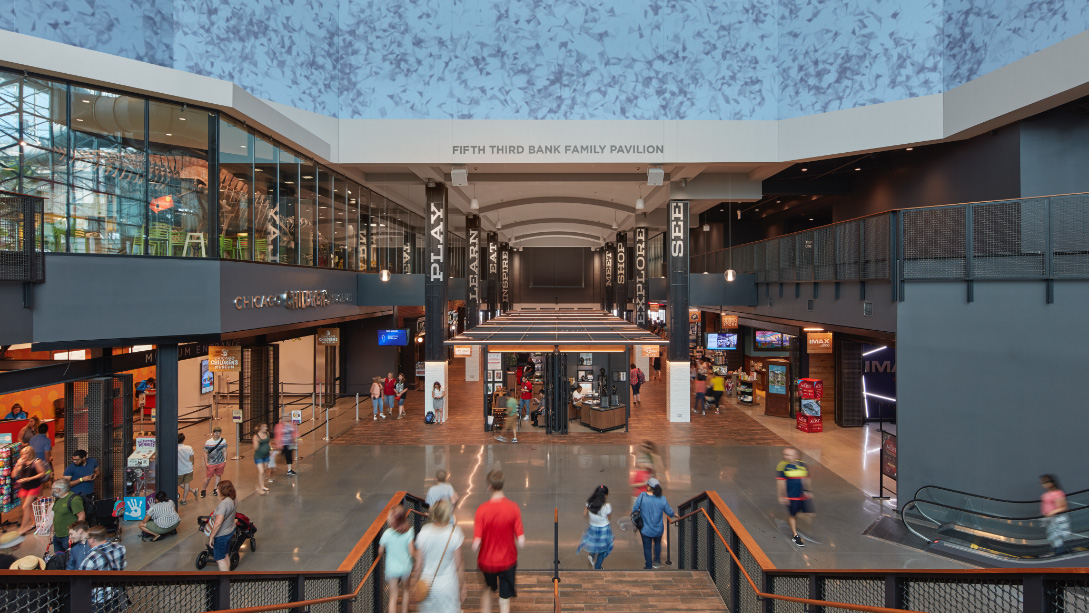 A group of people in a large building.