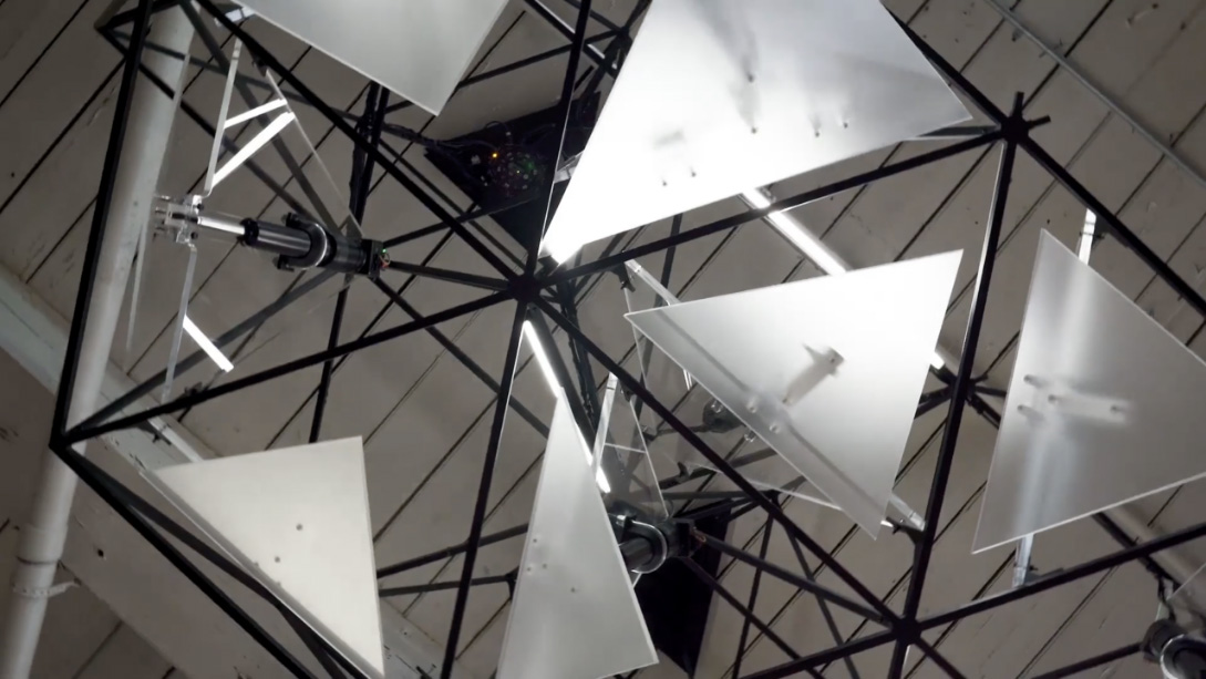 A group of white objects from a ceiling.