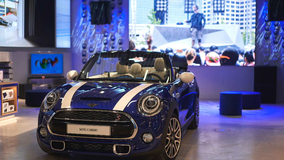 A car on a stage.