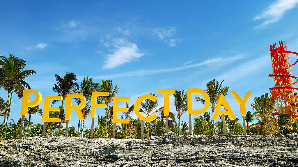 Yellow Perfect Day sign outside.