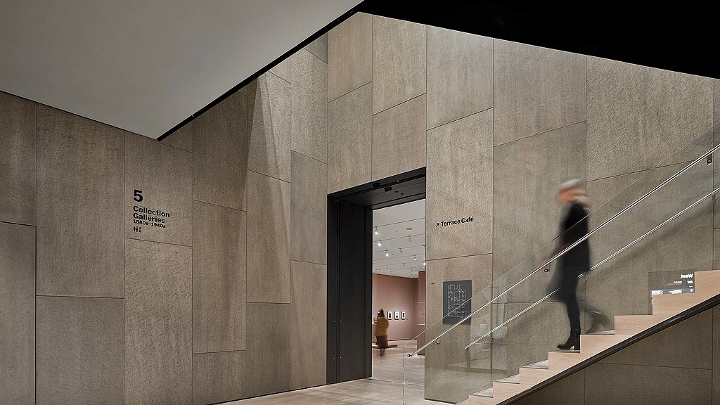A person walking down a flight of stairs.