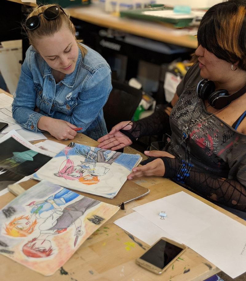 A few women painting.