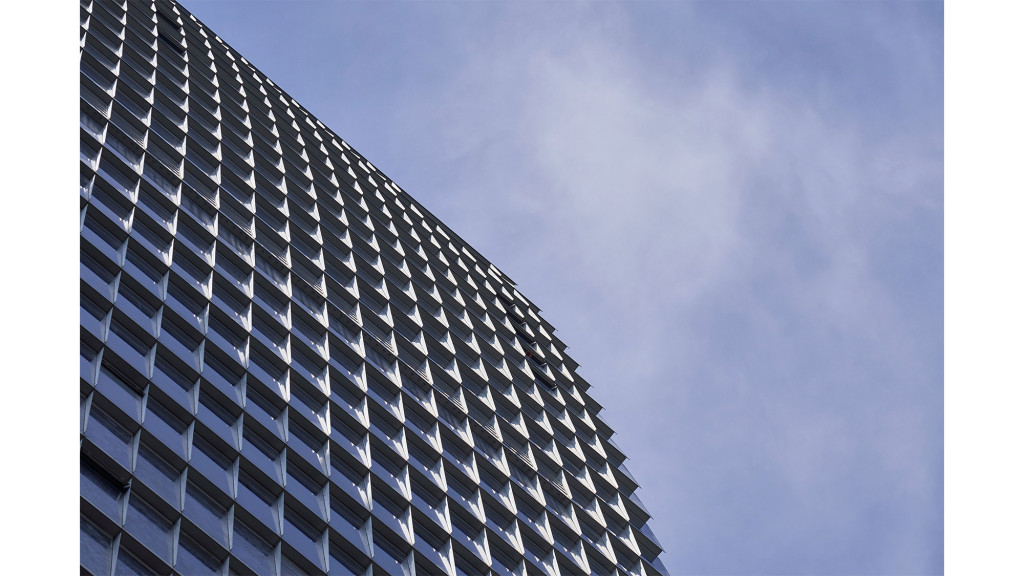 A tall building with many windows.