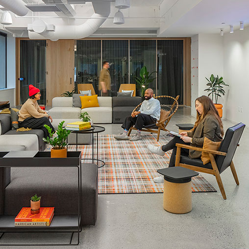 A group of people sitting in chairs.