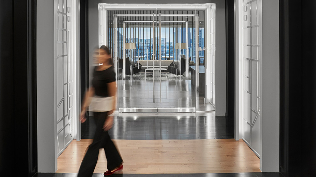 A person walking in a hallway.