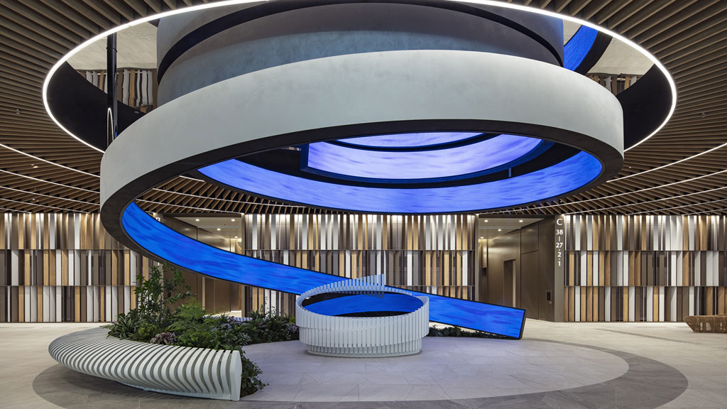 A modern looking building with a curved roof.