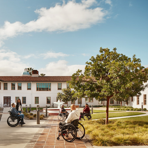 A group of people riding bikes.