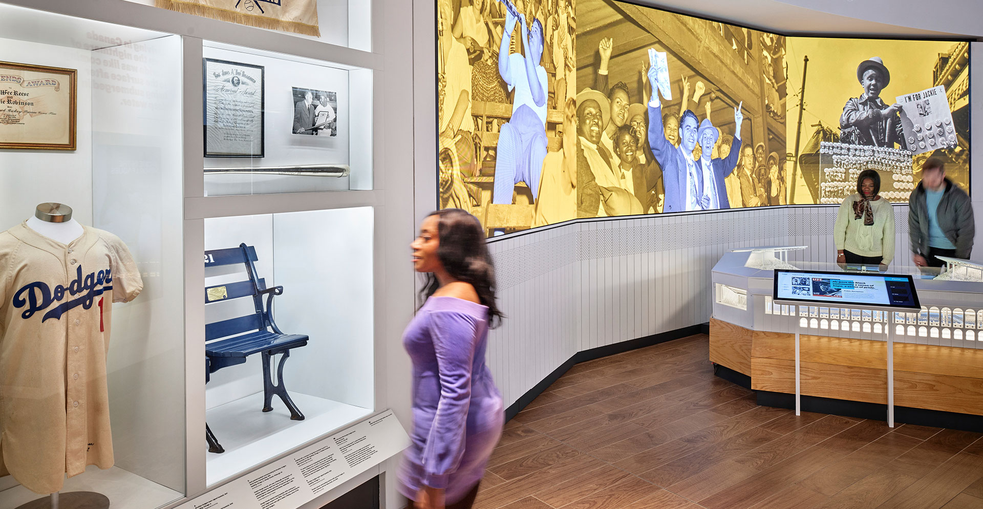 A person looking at a display of art.