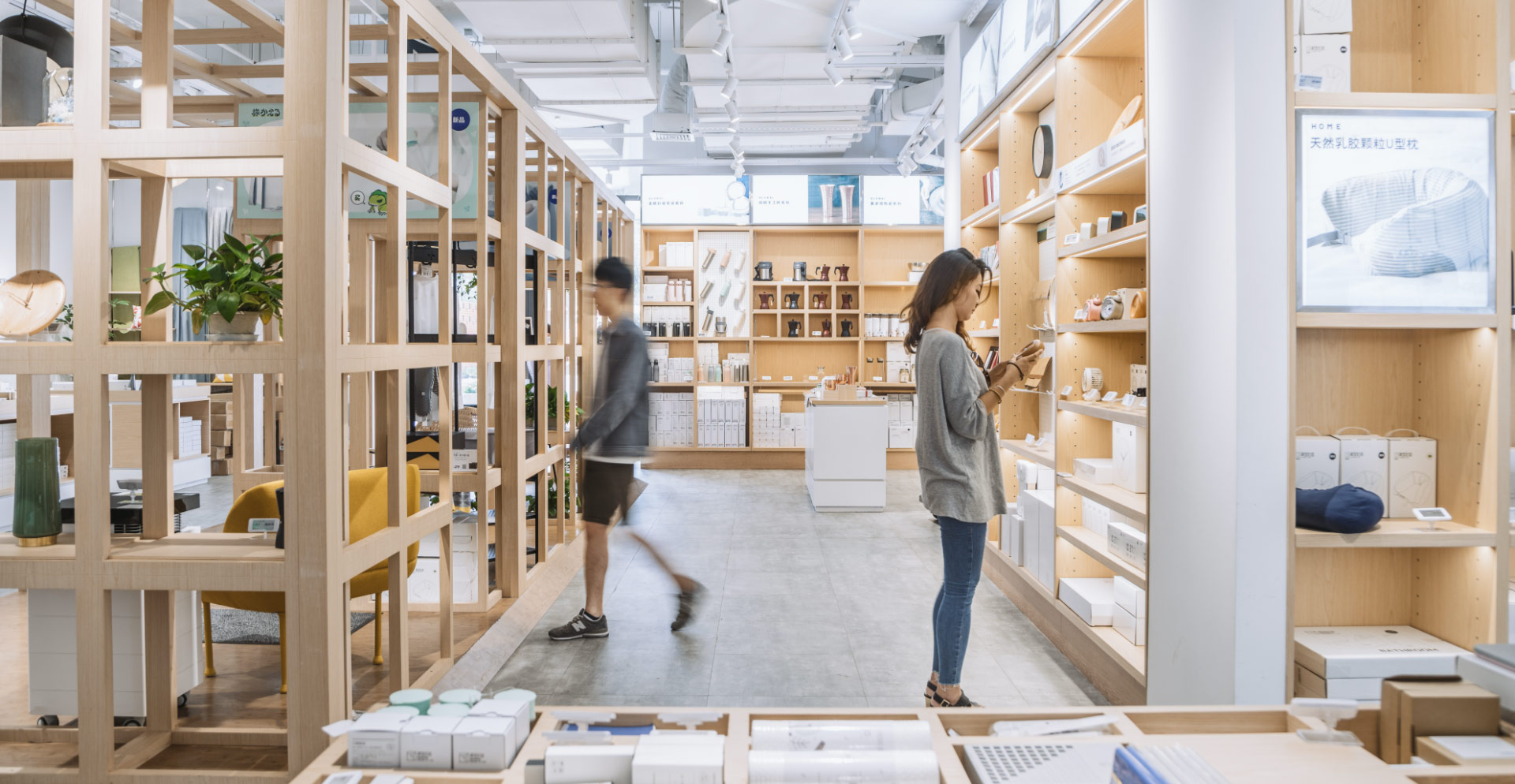 A man and a woman in a library.