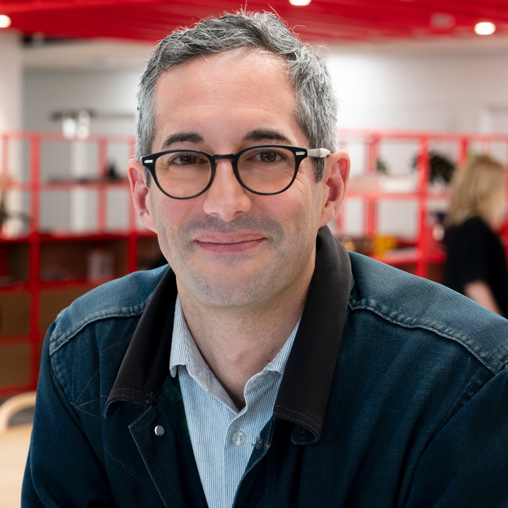 A man wearing glasses.