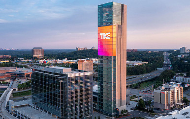 A tall building with a sign on it.