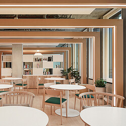 A room with tables and chairs.