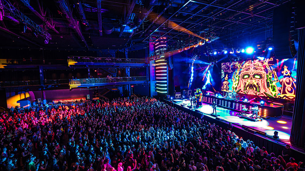 A large crowd of people in a concert.