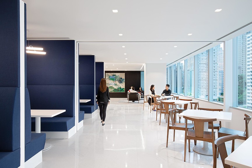 A room with tables and chairs.