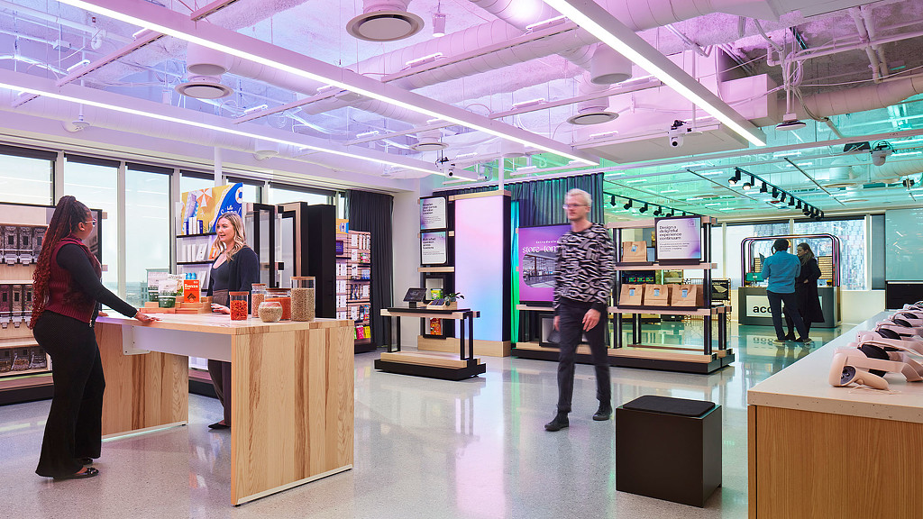 A group of people in a modern showcase space