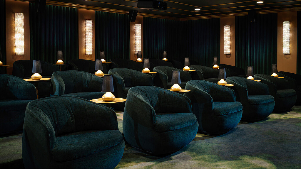 A room with blue chairs.