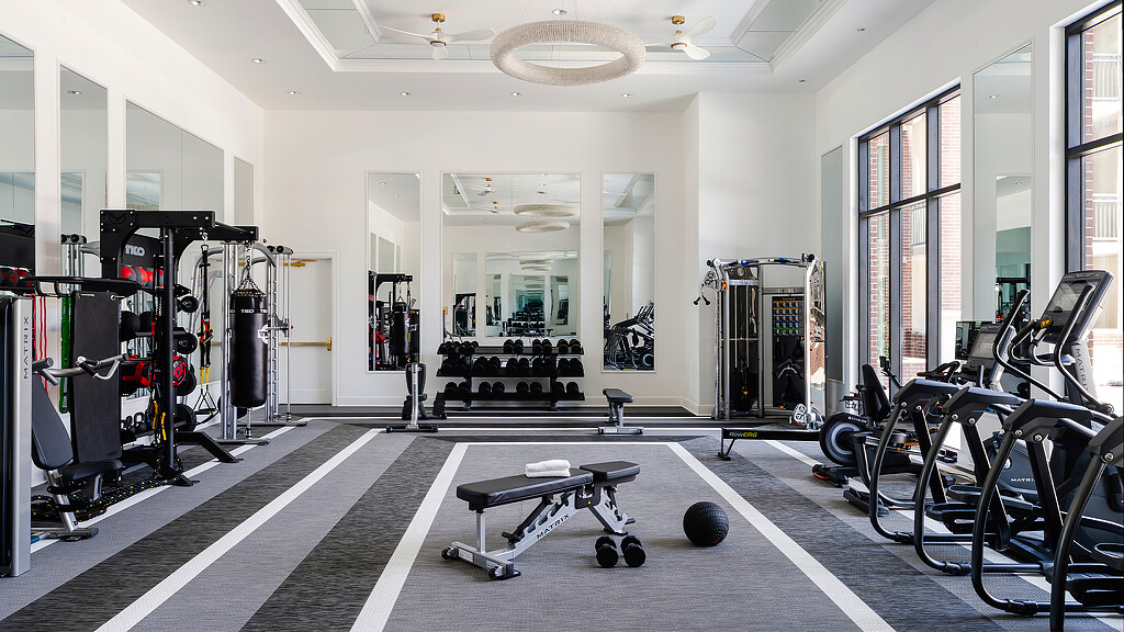 A gym with exercise equipment.