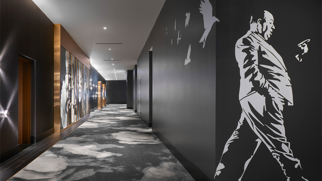 Star Cinema Grill hallway with Hitchcock film-inspired wall graphic