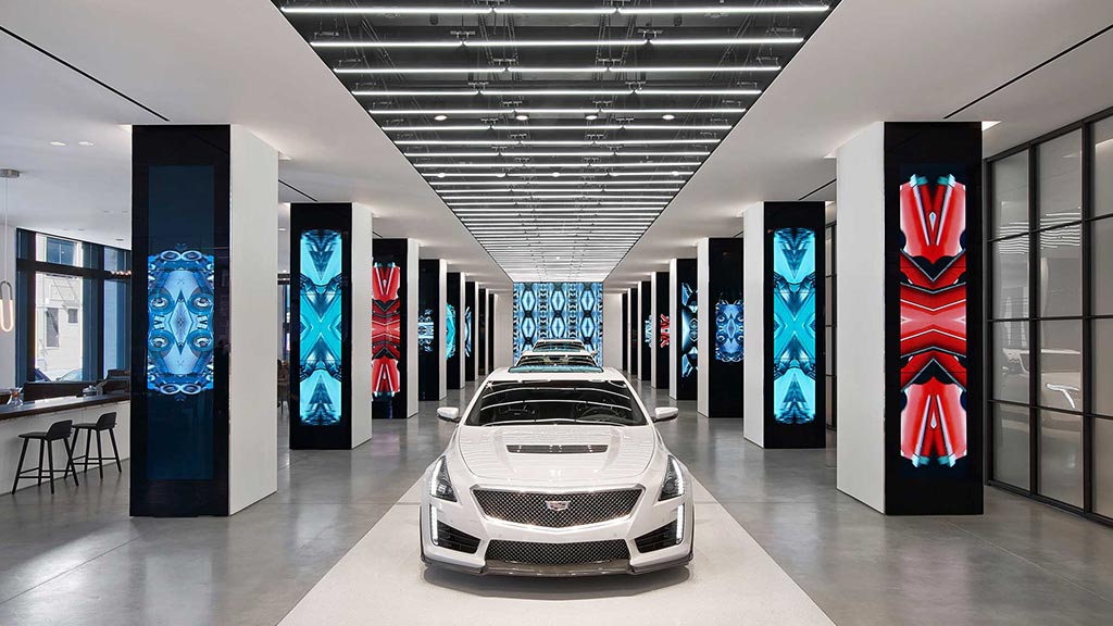 A white sports car in a building.