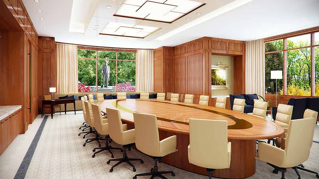 A room with a large table and chairs.