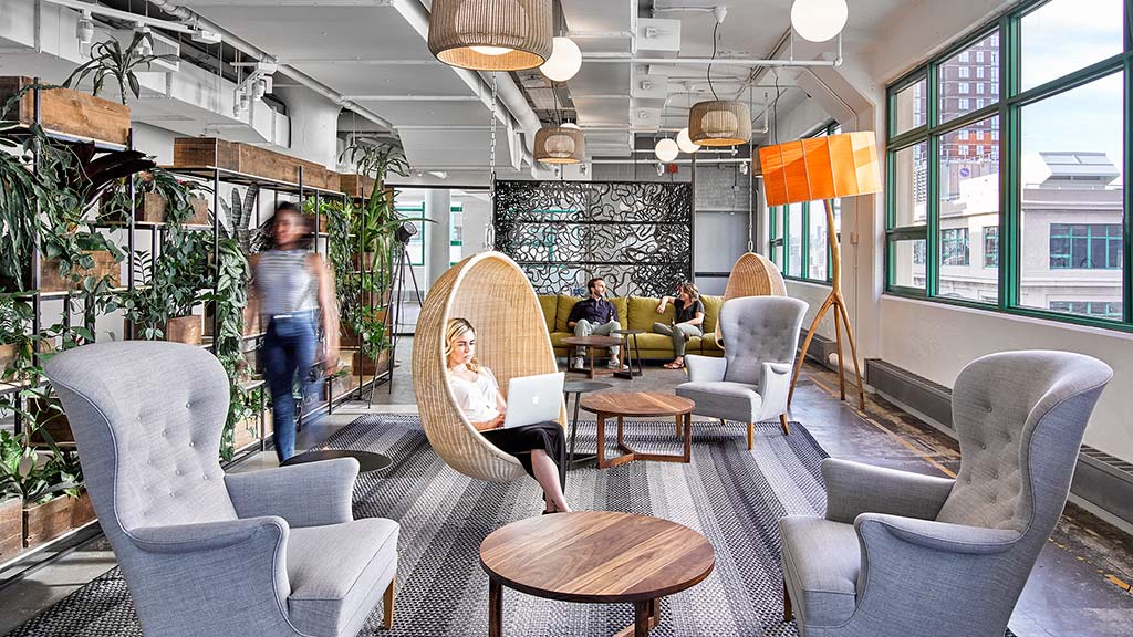 A room with chairs and tables.