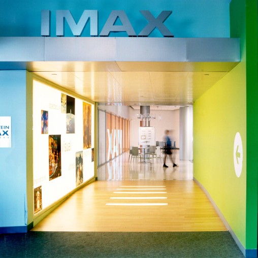 A person walking through a hallway.