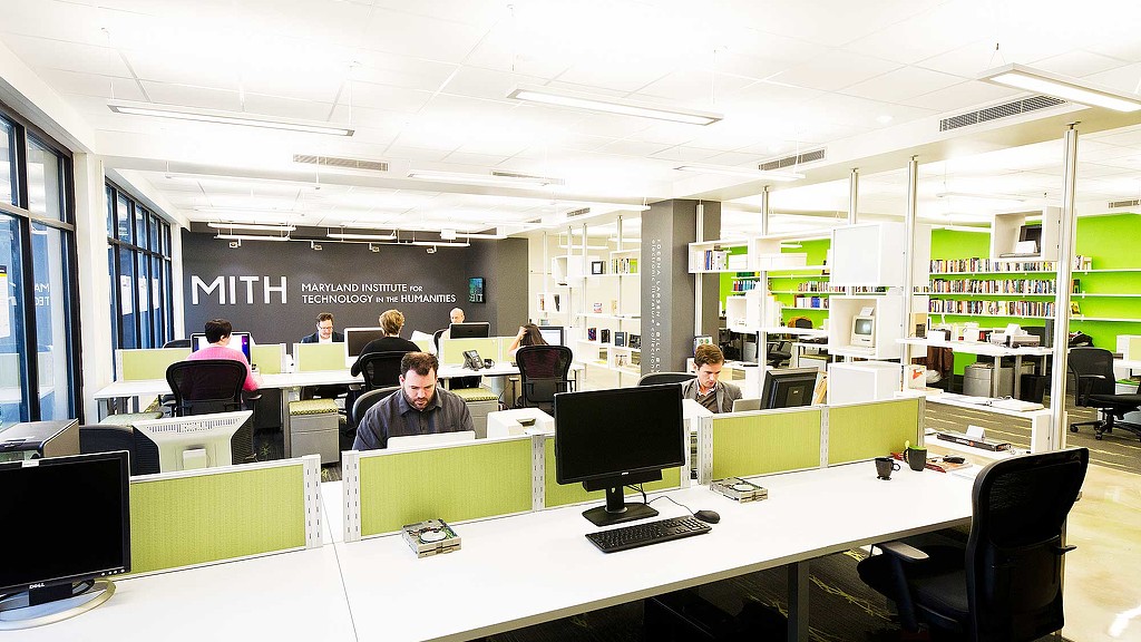 A group of people in an office.