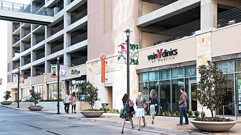 People walking on a sidewalk.