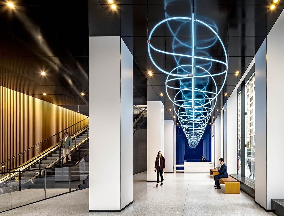 A large blue globe in a building.