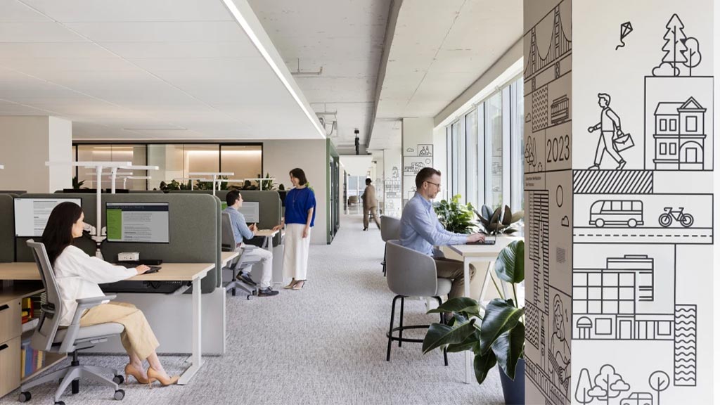 A group of people in an office.